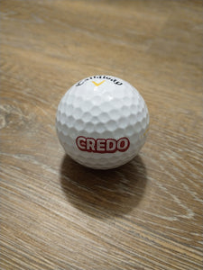Credo logo on golf ball